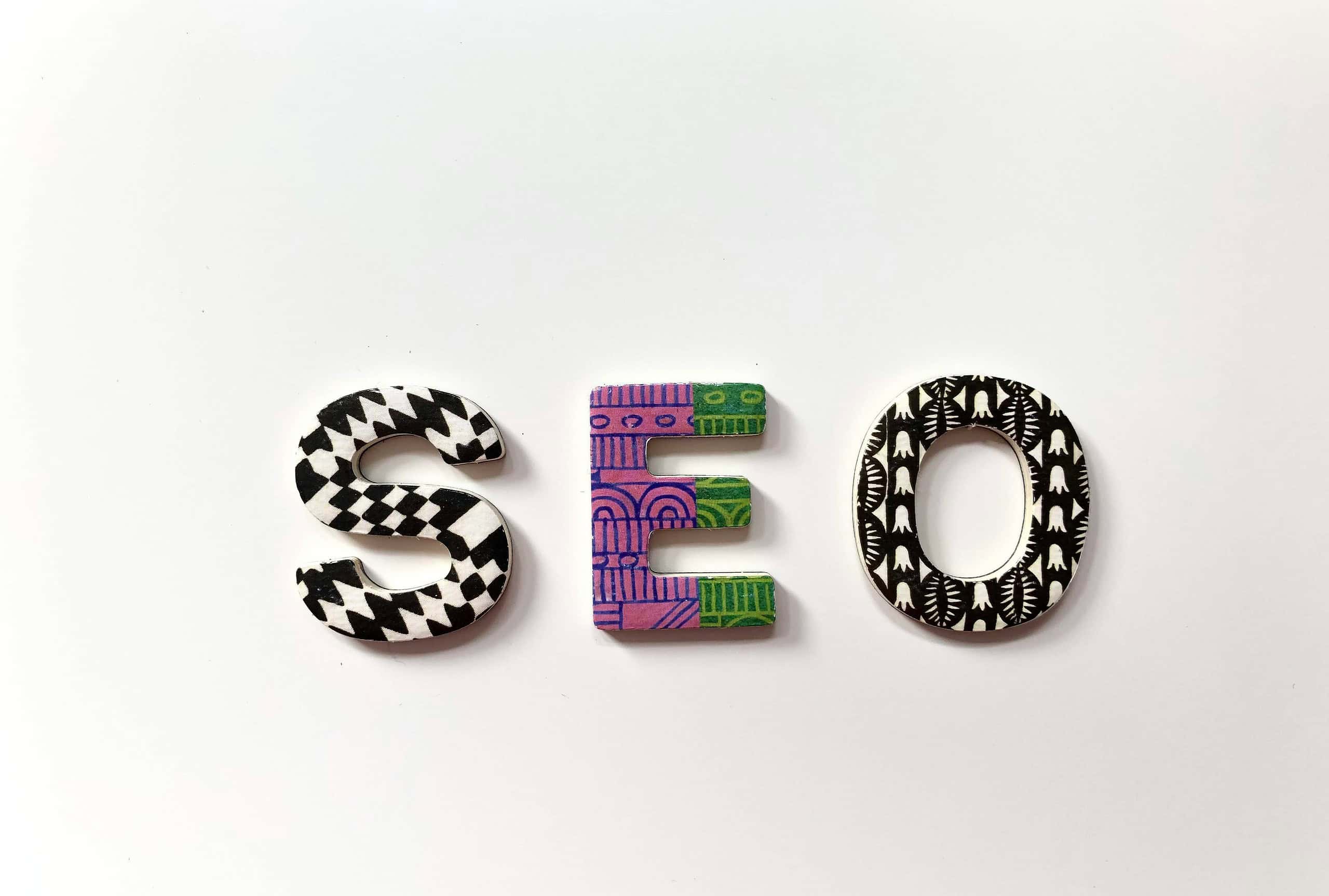Tech Reviews, Quality Unboxing & Digital Marketing 6 a colorful letters on a white surface