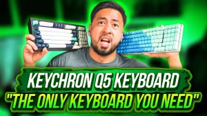 Review Articles 1 a man holding a keyboard